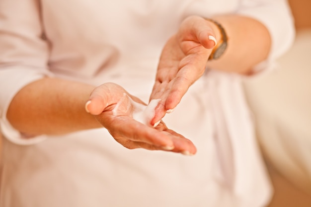 Nurse or doctor washing a hands before procedure