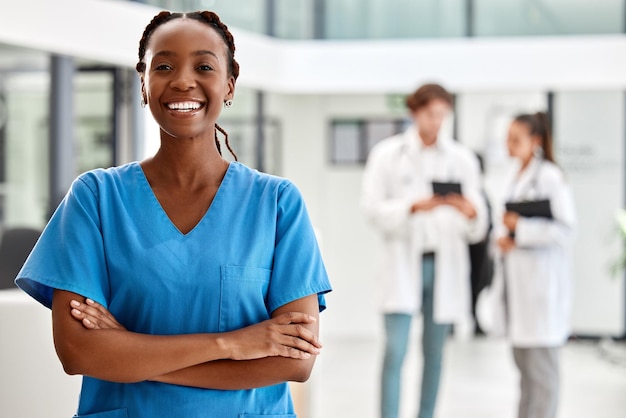 Nurse healthcare and medicine with a woman working in healthcare for health wellness or insurance in a hospital Portrait of a female medical student or professional standing arms crossed inside