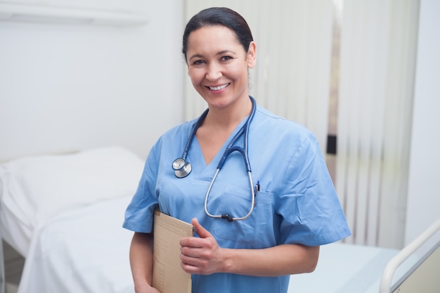 Nurse holding a medical folder