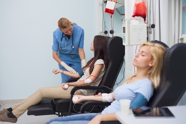 Nurse looking after a blood donor