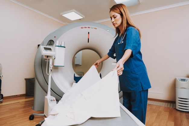 Nurse Making Couch of MRI Scanner Radiology