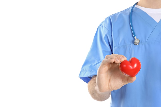 Nurse man holds heart, isolated on white background