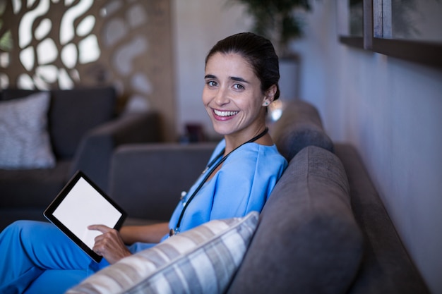 Nurse using digital tablet