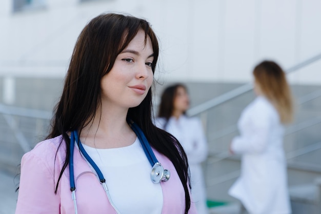 The nurse who stands outside the hospital Portrait of a professional doctor