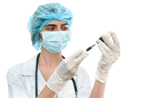 Nurse with syringe getting ready for injection