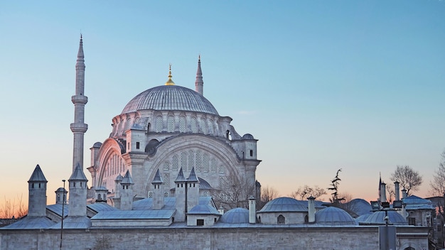 Nuruosmaniye Mosque one of Baroque style mosques in Istanbul, Turkey at dawn.