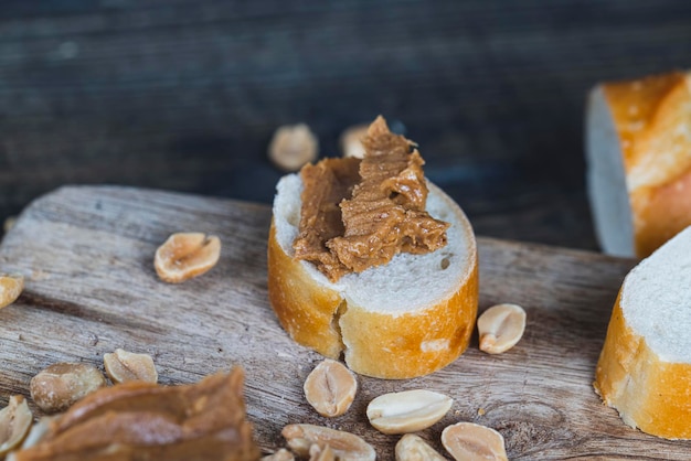 Nut food on a cutting wooden board in the kitchen