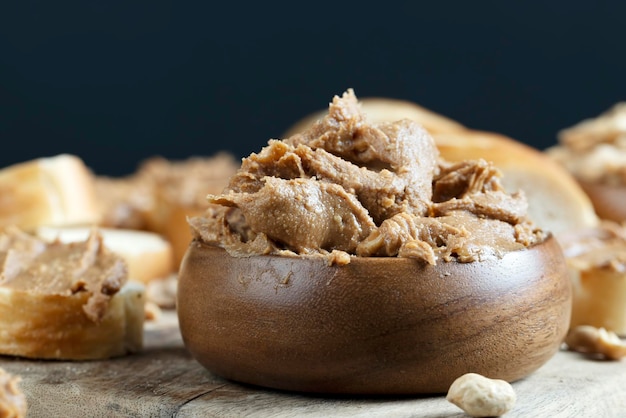 Nut food on a cutting wooden board in the kitchen