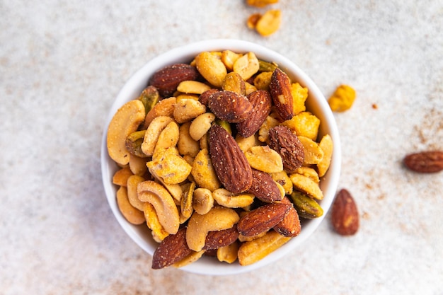 nut mix almond, cashew, pistachio, peanut fresh nuts meal food snack on the table copy space food 