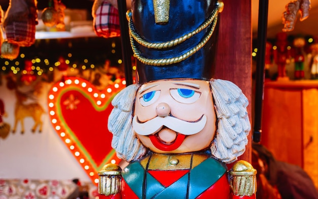 Nutcracker on Christmas Market at Alexanderplatz in Winter Berlin, Germany. Advent Fair Decoration and Stalls with Crafts Items on the Bazaar.