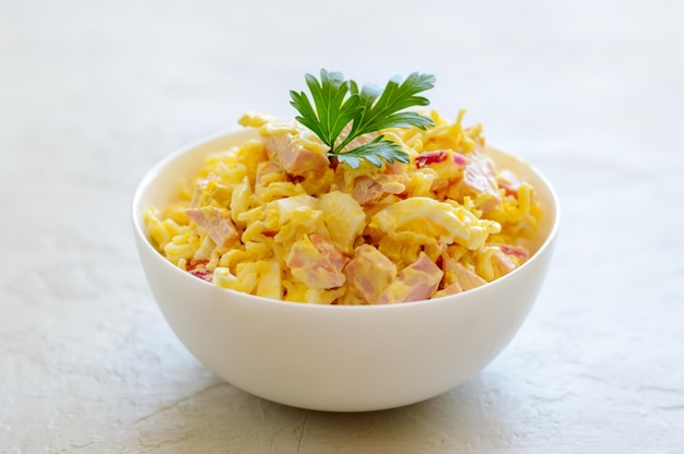 Nutritious salad with instant noodles eggs ham and red onion