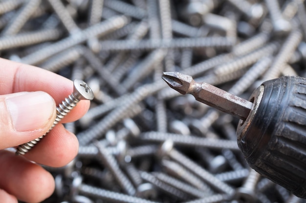 Nuts Bolts Screws closeup on white background