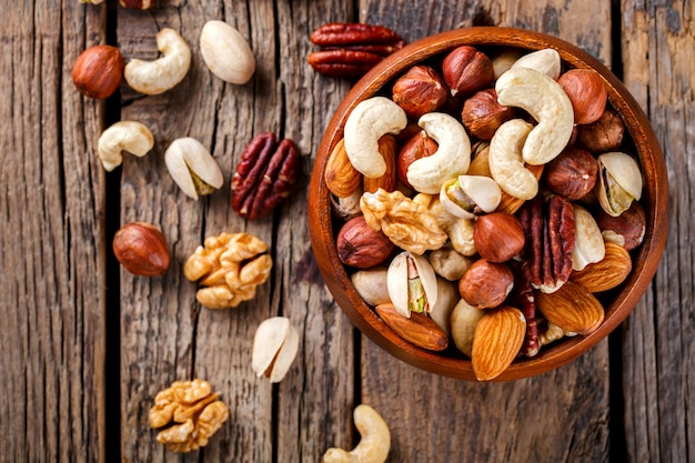 Nuts Mixed in a wooden plate.Assortment