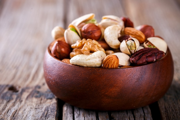 Nuts Mixed in a wooden plate