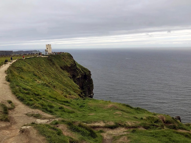 O'Brien's Tower on top of Irish Cliffs of Moher, county Clare, Wild Atlantic way, west of Ireland