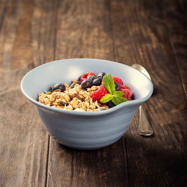 Oat granola with berries and yoghurt