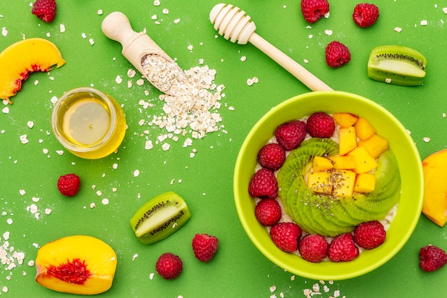 Oatmeal bowl with fresh berries and fruits