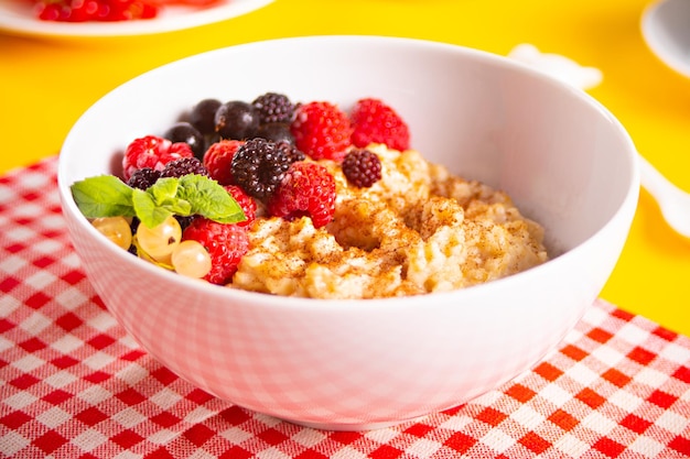 Oatmeal cereal porridge with fresh berries Healthy breakfast