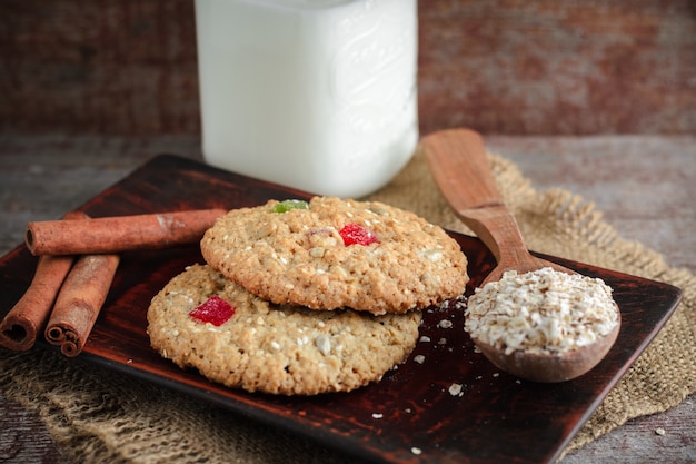 Oatmeal cookies on a wooden backgroun