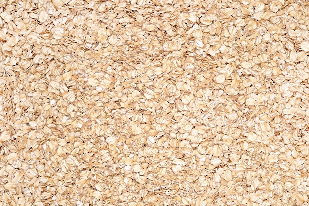 Oatmeal flakes close up as background