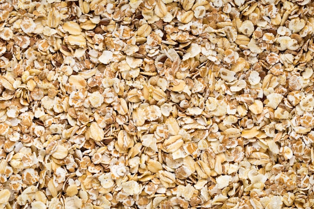 Oatmeal flakes, macro studio shoot. Healthy food.