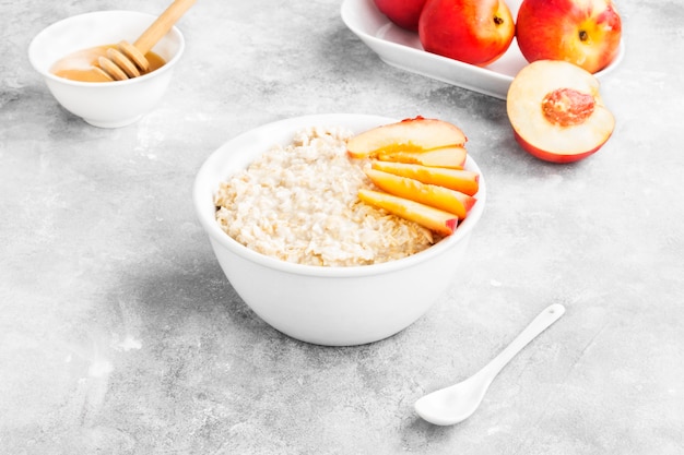 Oatmeal with nectarine and honey