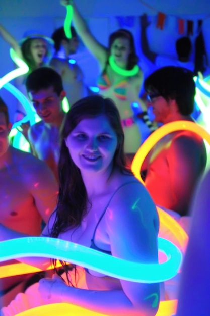 Photo obese 20something girl at a neon rave party