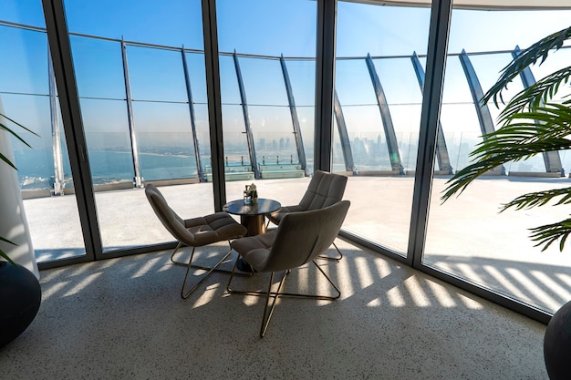 Observation deck at top of a skyscraper on the roof View of the artificial Palm Jumeirah island