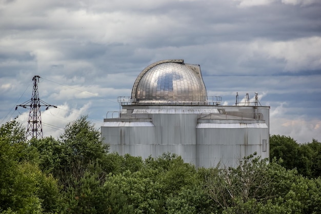 Observatory and telescope to study beyond the universe