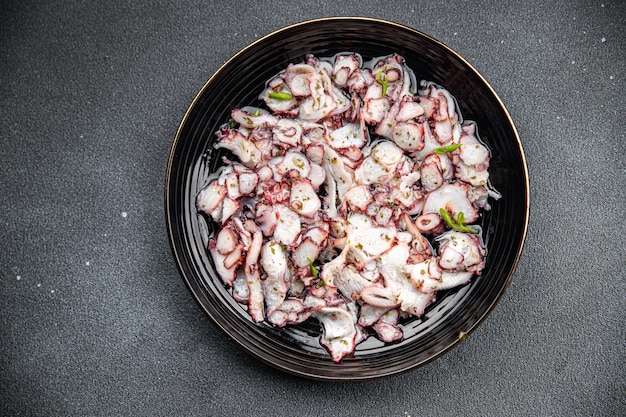 octopus carpaccio marinated seafood salad healthy meal food snack on the table copy space food