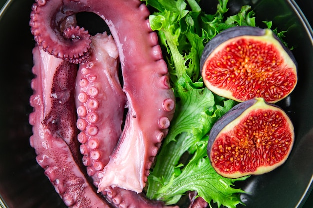 Octopus food tentacle seafood salad meal snack on the table copy space food background rustic