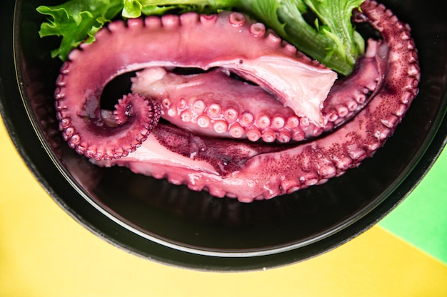 Octopus food tentacle seafood salad meal snack on the table copy space food background rustic