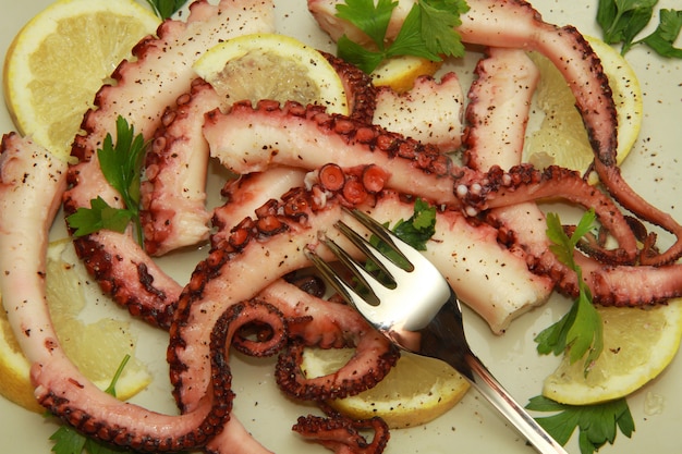 octopus salad with lemon slices