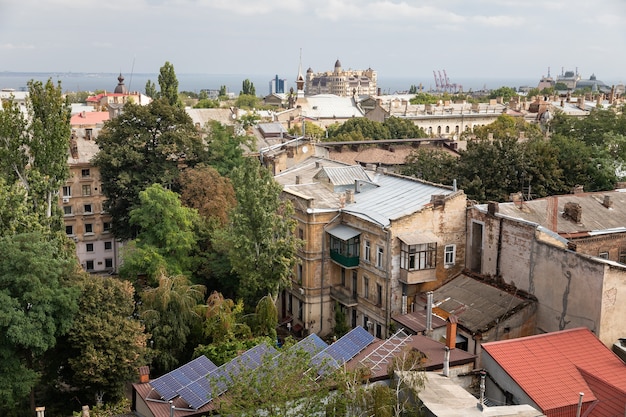 Odessa, Ukraine - Sep. 09, 2018: Aerial view of the roofs and old courtyards of Odessa. View of Odessa from the roof. Buildings of old city