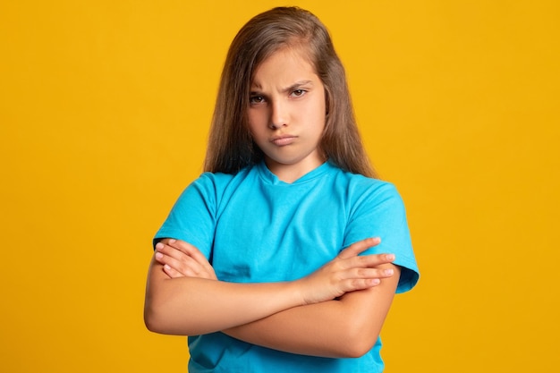 Offended child disobedience bullying kid punishment failure blame portrait of upset young girl in