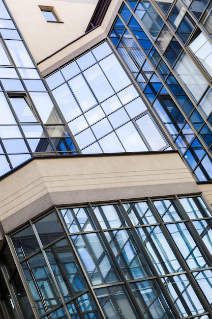 Office building close up with large glass windows.