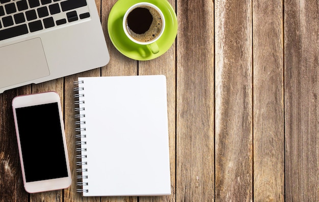 Office desk concept notebook and coffee