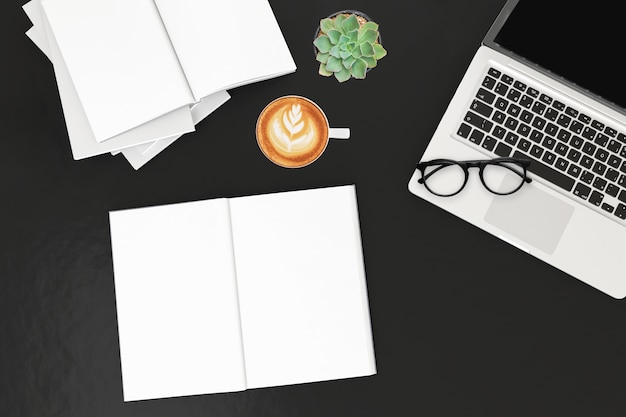 Office desk table with labtop computer,blank magazinesmart phone and coffee cup. Top view with copy space,3D rendering