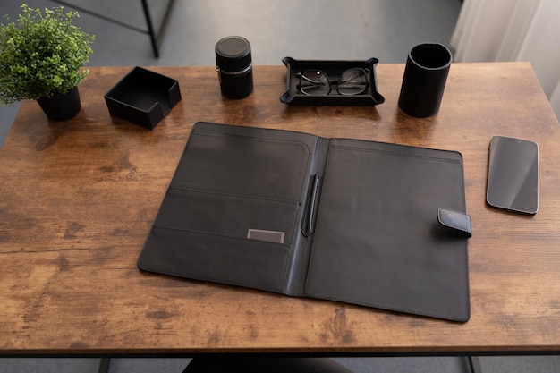 Office desk with stationery leather folder for papers and documents