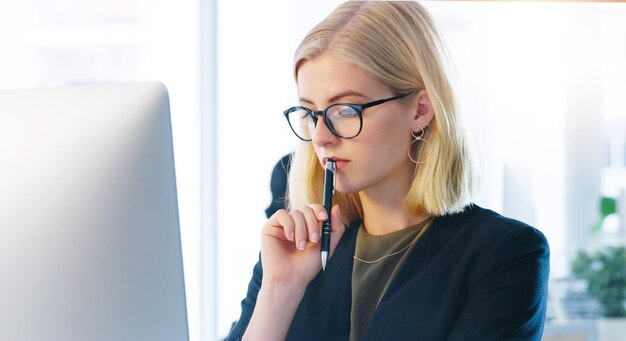 Photo office glasses and computer for thinking woman and vision for ideas job and receptionist in agency secretary laptop and internet in workplace email and schedule of company by person or employee