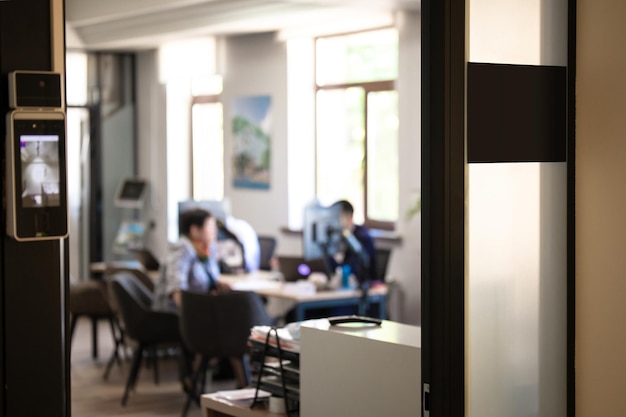 Office interior with glass door and frosted panel