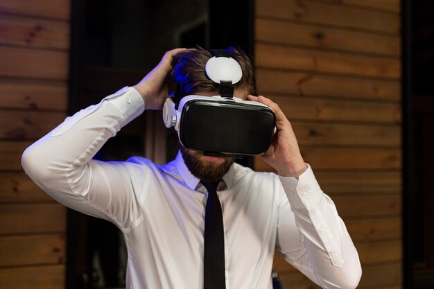 office manager in formal clothing wearing virtual reality vr glasses