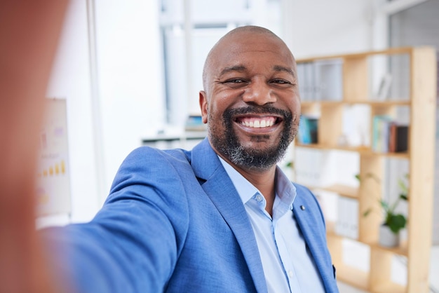 Office selfie business and portrait of black man ceo or company leader happy with financial sales profit Work break African and face of entrepreneur with smile for startup small business success