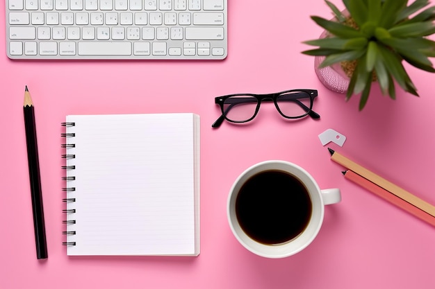 Office Setup on Pink Background with Notebooks