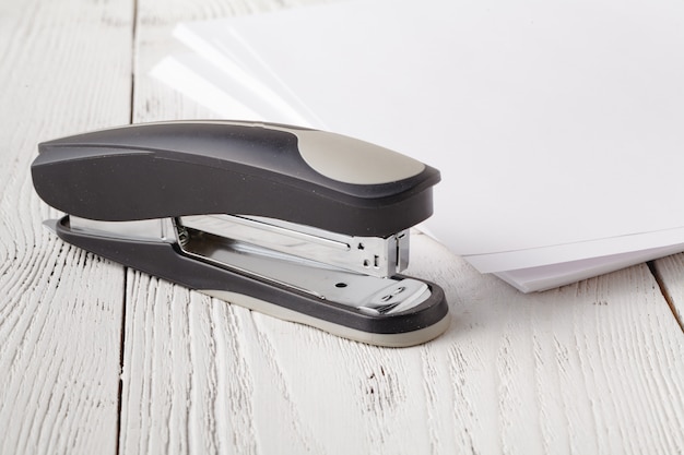 Office stapler on a white background table