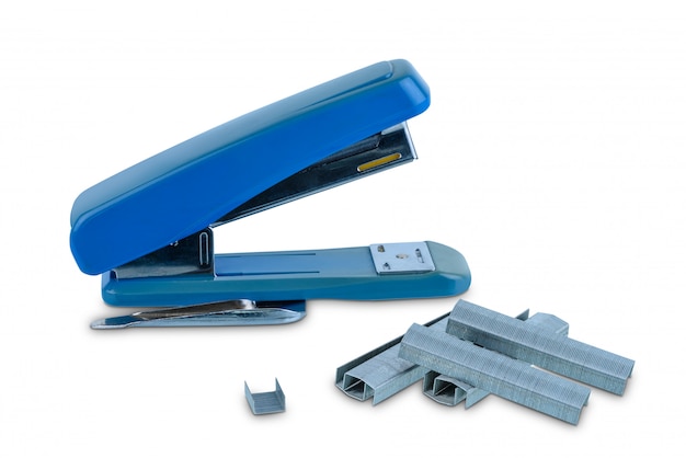 Office stationary Blue stapler with pile of staples isolated