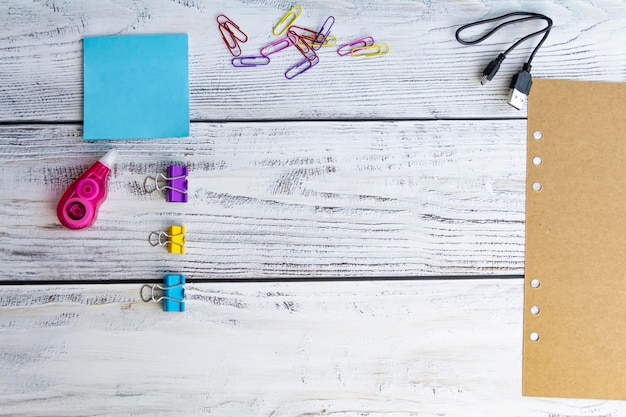 Office supplies for work sales and study on a wooden background