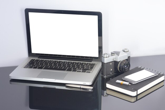 Office table with computer and supplies