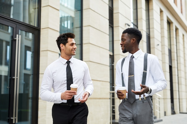 Office workers with coffee in the city