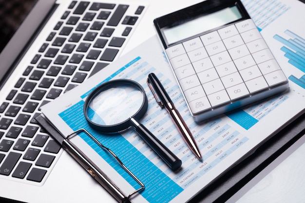 Photo office workplace with magnifier and stationery